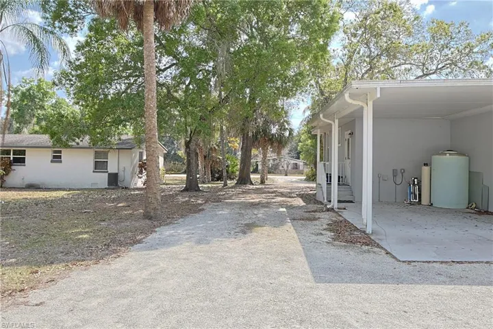View of yard featuring driveway