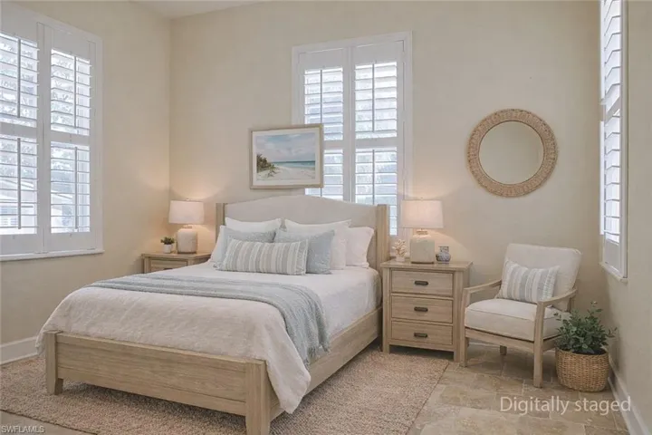 Bedroom with multiple windows