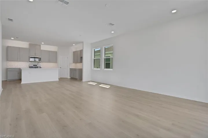 The sample photos included are of the model home and are meant to showcase the craftsmanship and design quality.
