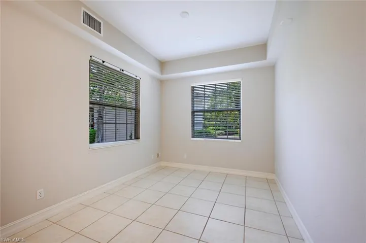 Den space off of the Dining Room. Add French Doors to make it an additional sleeping space , office or family room area.