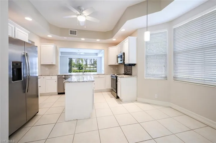 Kitchen with space for a table, built in banquet and I also seen it as an Art Space for Painting!