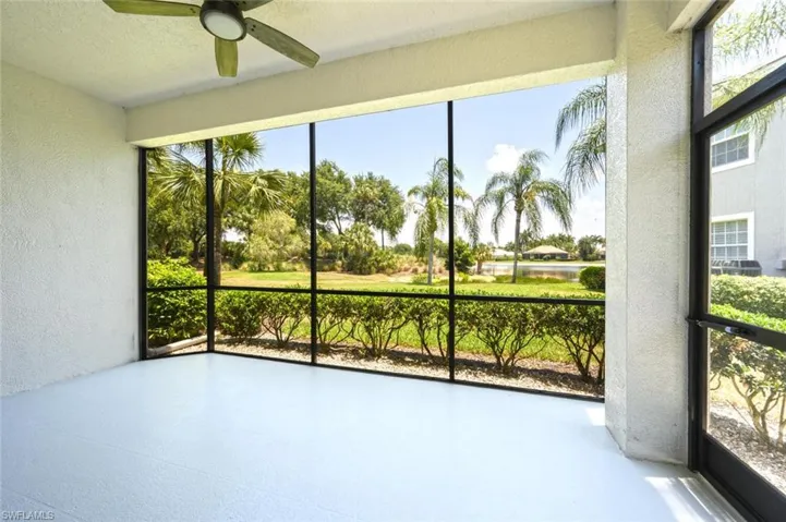 Screened in Lanai with Newly Painted floor, spacious back yard area and lake view