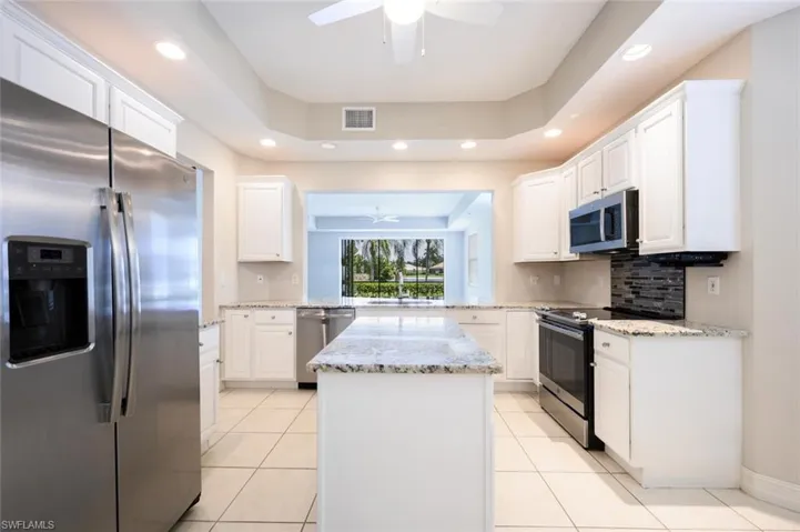 Kitchen GE stainless steel appliances and Granite Counter Tops