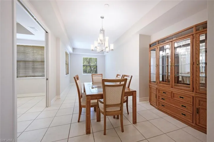 Formal Dining area with pocket doors to close off the room from the kitchen. Some people use this as a family room area