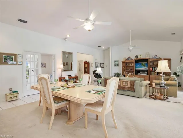 Dining area with a light-toned octagonal table and upholstered chairs