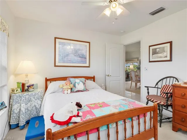 Bedroom featuring light-colored walls and tile flooring