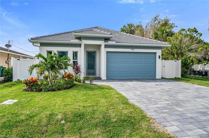 Front of house beautifully landscaped