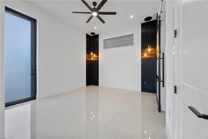 Mother in Law Primary room with a ceiling fan and recessed lighting