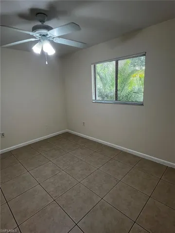 Guest room overlooks private landscaped area.