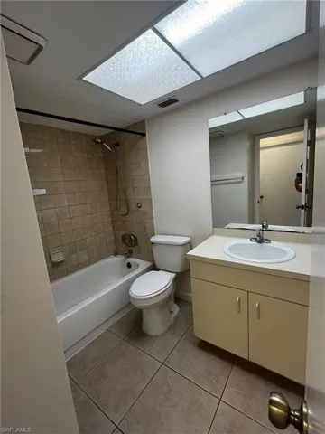 Guest bathroom features tiled Shower/Tub combo