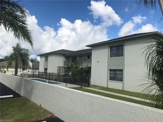 This small complex offers a bit of privacy, assigned parking spot and community pool.