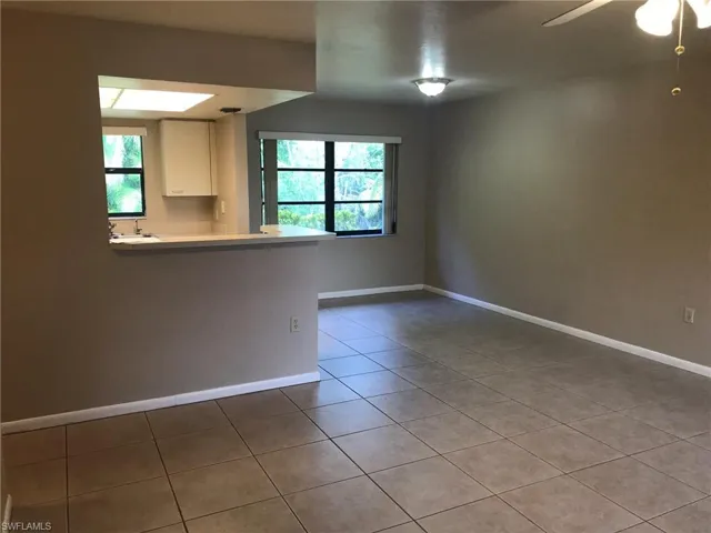 Spacious dining area adjacent to kitchen.