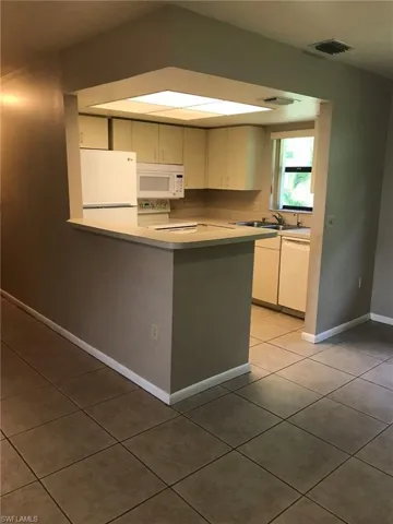 Heart of the home, kitchen overlooks the open living area.
