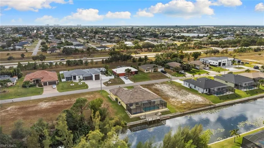 Aerial view of residential area with a canal view
