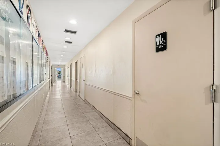 Rear entrance, hallway, and restrooms