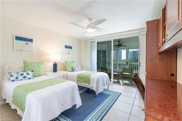 Second bedroom featuring access to 2nd exterior lanai