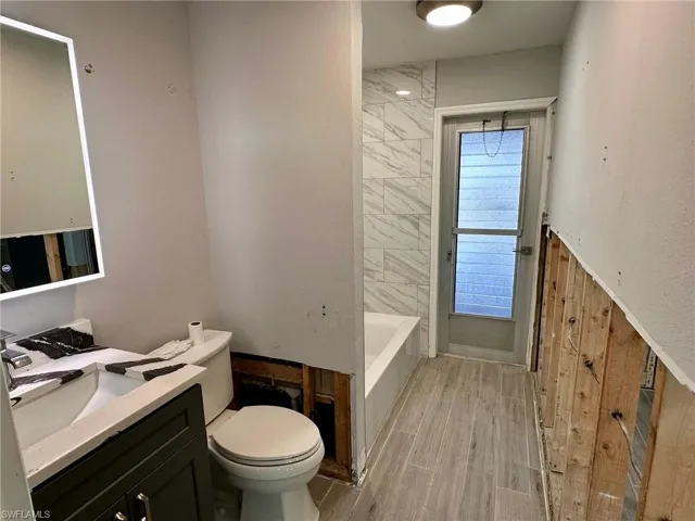 Bathroom with vanity and toilet