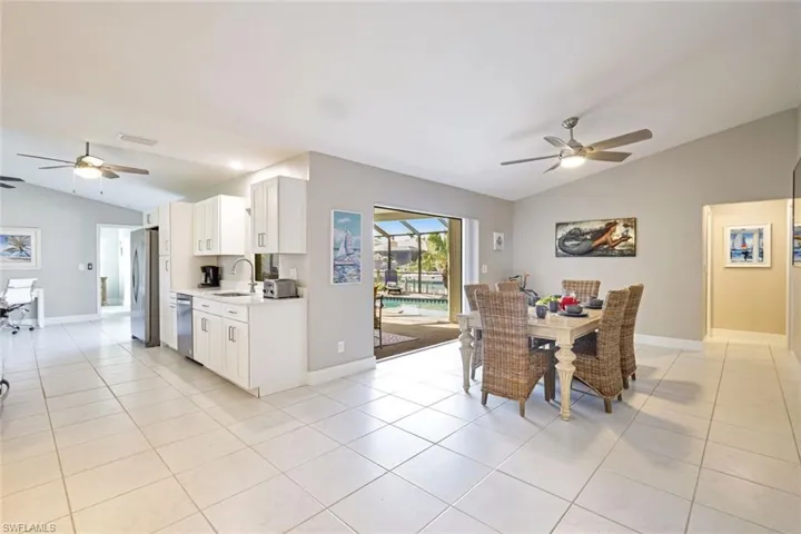 The open plan Family Dining area with sliding doors to the Pool Deck