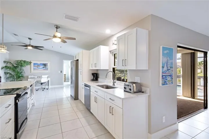 The Kitchen is bright and modern with views over the Pool area