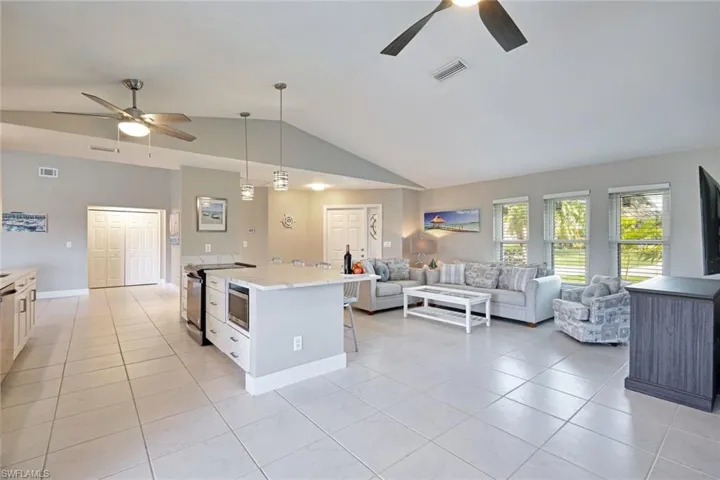 The modern Kitchen overlooks the Living area