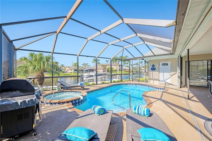 View of the south facing Pool Deck with automated Hot Tub
