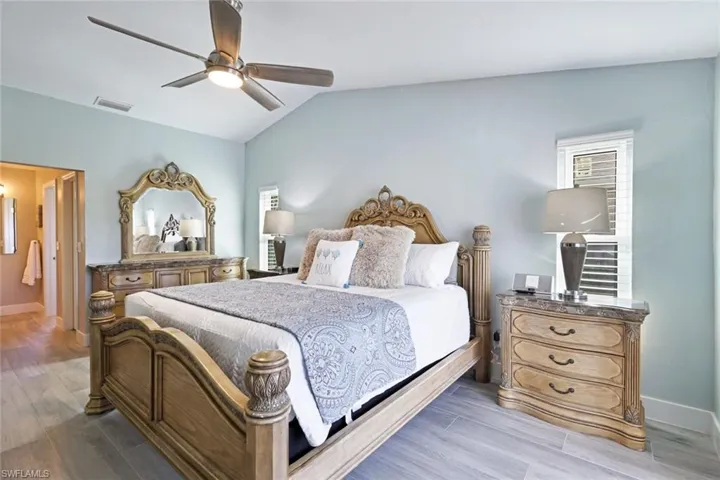 The Master Bedroom with sliders to the Pool Deck
