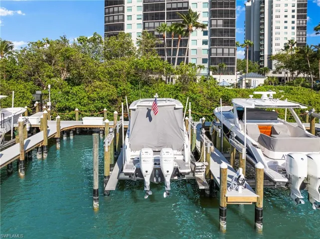 View of dock featuring a water view and boat lift