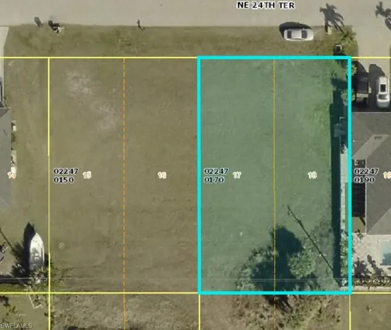 Aerial map of property and surrounding area featuring property boundaries highlighted