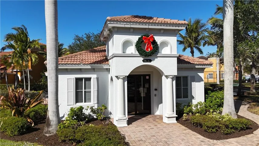 View of mediterranean / spanish clubhouse with gym