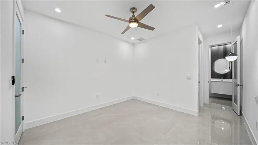 Unfurnished bedroom featuring recessed lighting and ceiling fan