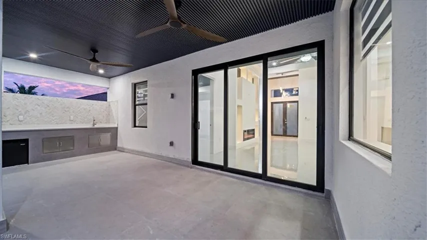 View of patio / terrace with a ceiling fan
