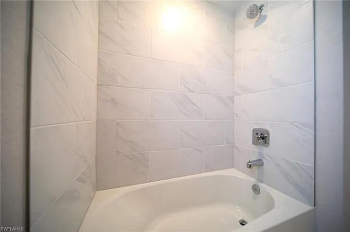 Spare Bathroom Tiled Tub Area!