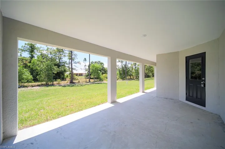 This Amazing Oversized Lanai With a priviate entry into the master bedroom.  Great for Entertain!  Plenty Of Room For A Pool!!