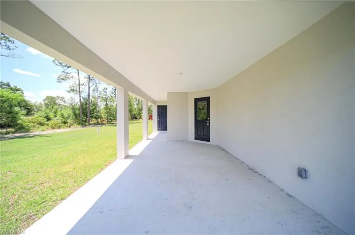 This Amazing Oversized Lanai With a priviate entry into the master bedroom.  Great for Entertain!  Plenty Of Room For A Pool!!