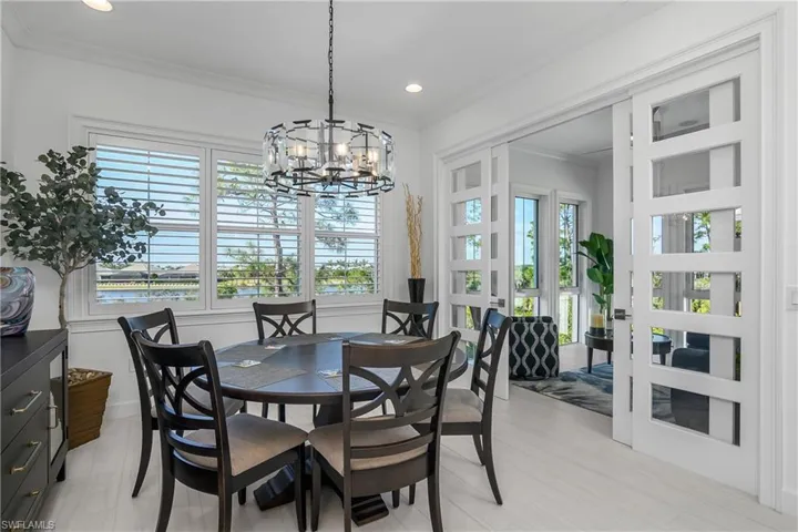 Another angle of the dining area, with views of the Sun Room.