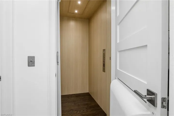 Elevator and hardwood / wood-style floors.