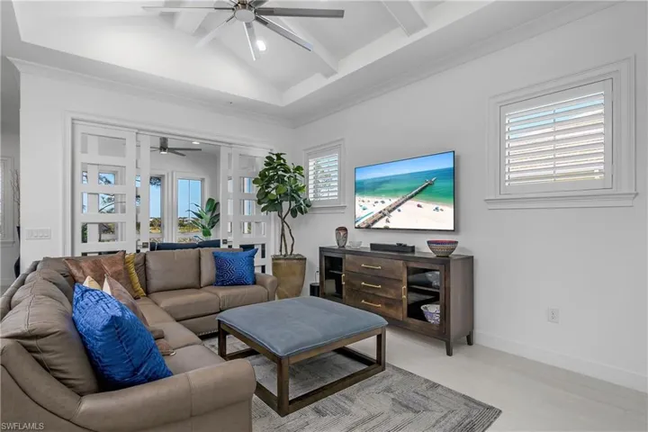 Another angle of the living space. Note the Volume Ceiling and Wood Plank detail.