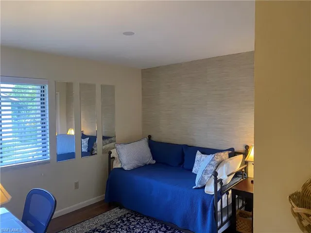 Bedroom 2 with hardwood / wood-style flooring