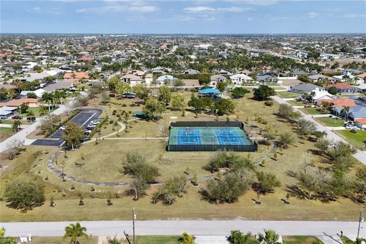 Nearby Camelot park with pet friendly walking paths, pickle ball or tennis and play ground