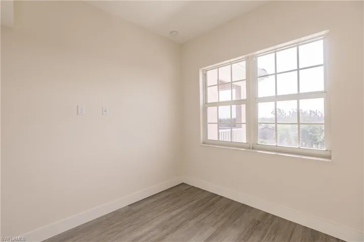 Bedroom 2 featuring vinyl plank flooring
