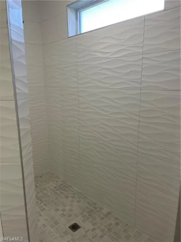 Bathroom with a tile shower