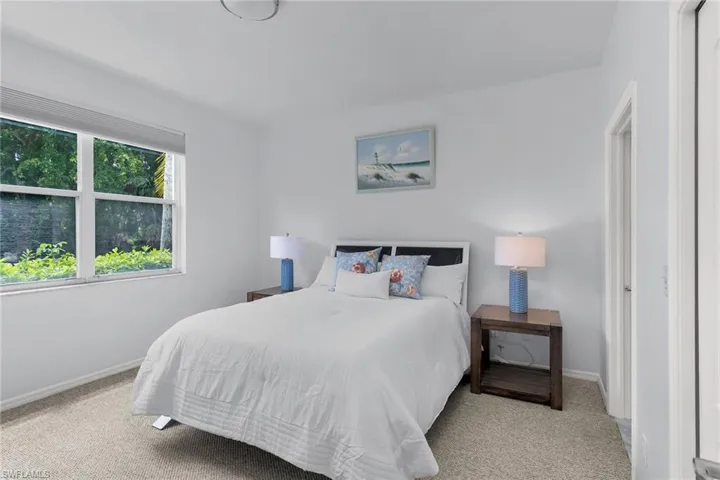 Bedroom with light carpet master bedroom