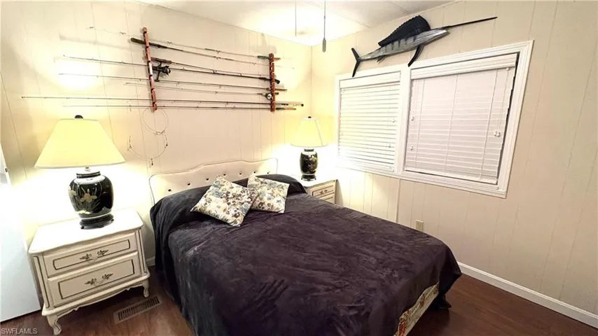 Second Bedroom features wood-finish flooring.