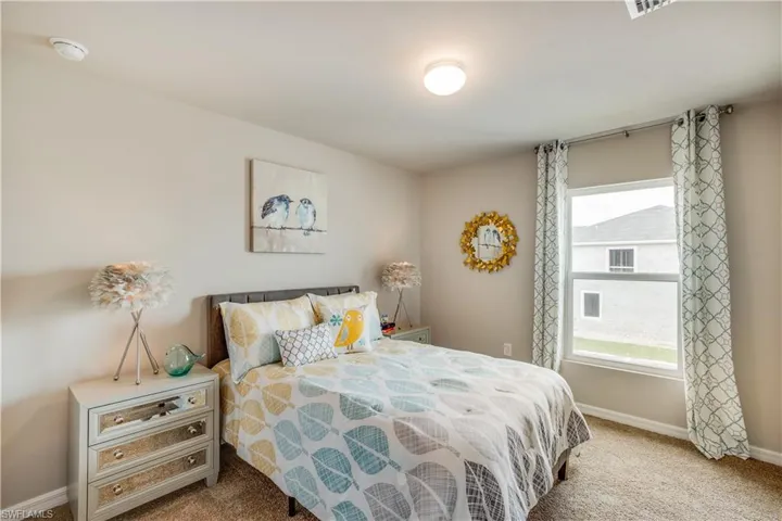 Bedroom with carpet floors