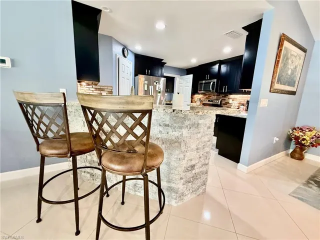 1302  Magnolia  AVE, Lehigh Acres, FL 33972