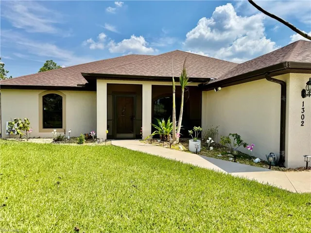 1302  Magnolia  AVE, Lehigh Acres, FL 33972