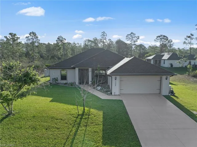1302  Magnolia  AVE, Lehigh Acres, FL 33972