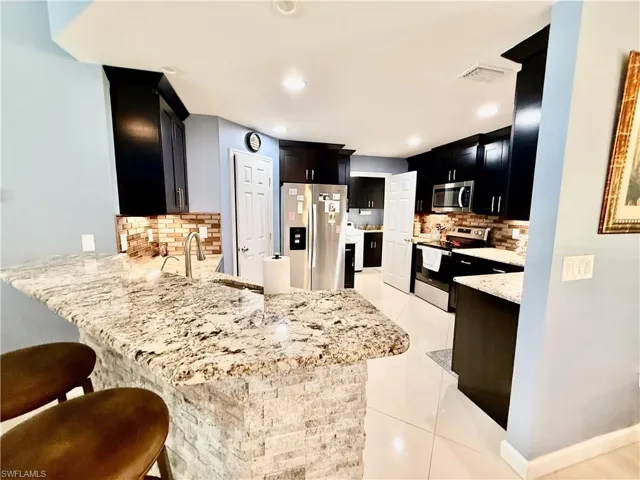 1302  Magnolia  AVE, Lehigh Acres, FL 33972