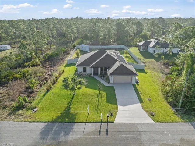 1302  Magnolia  AVE, Lehigh Acres, FL 33972