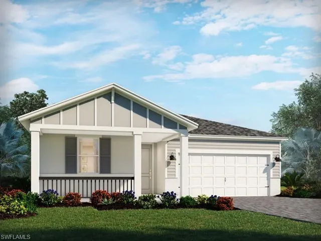 View of front of property with an attached garage, covered porch, decorative driveway, a front lawn, and board and batten siding